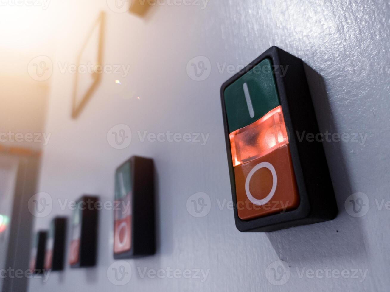 ON-OFF Switches with indicator light on in electrical panel control. photo