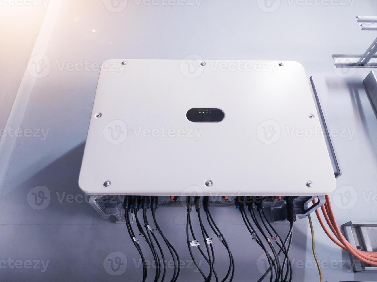 Instalation control of inverters solar panel on the wall. Technology of solar energy with shiny light. photo