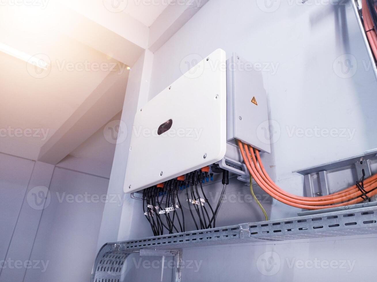 Instalation control of inverters solar panel on the wall. Technology of solar energy with shiny light. photo