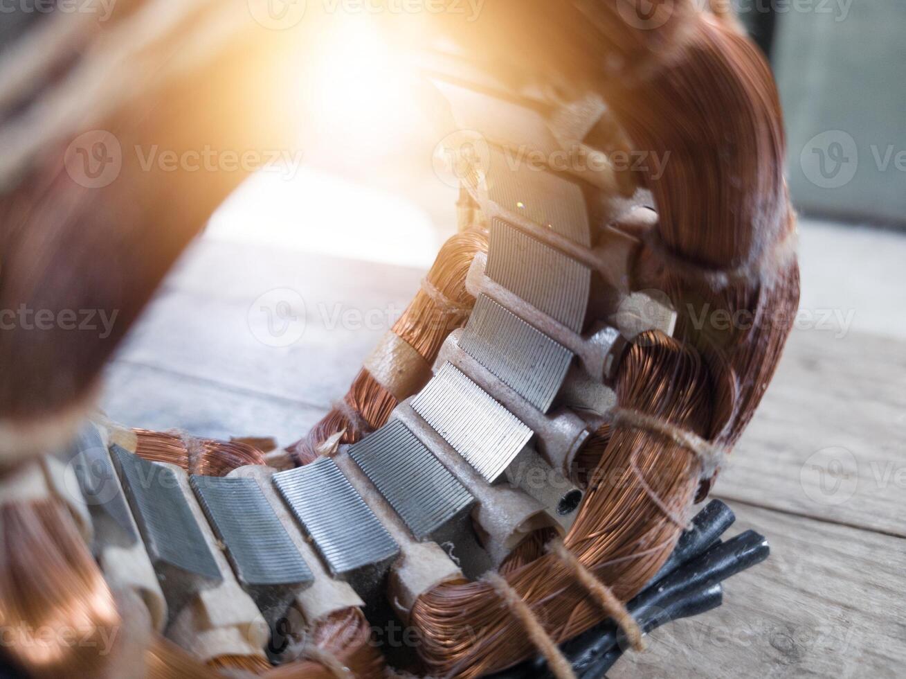Electric motor winding coil , three phase induction motor winding coil assembly, procedure for replacing.With shiny light. photo