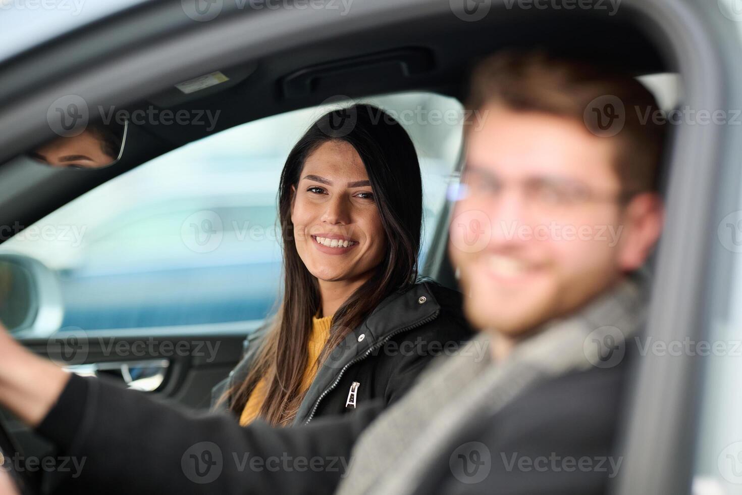A romantic couple embarks on a scenic road trip across Europe, exploring captivating landscapes and creating unforgettable memories together photo