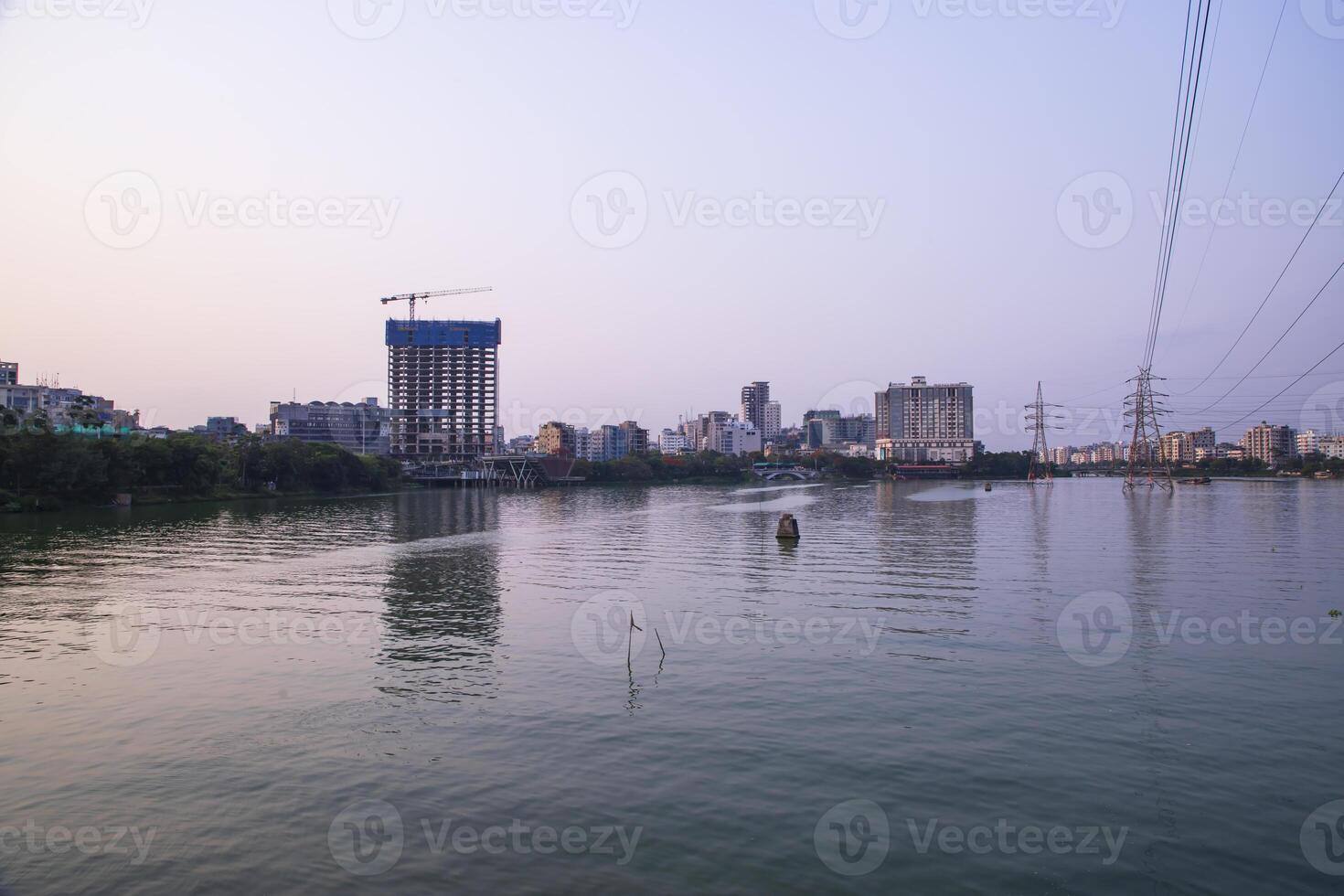 Beautiful Skylark landscape view of Hatirjheel lake with blue sky in Dhaka-Bangladdesh photo