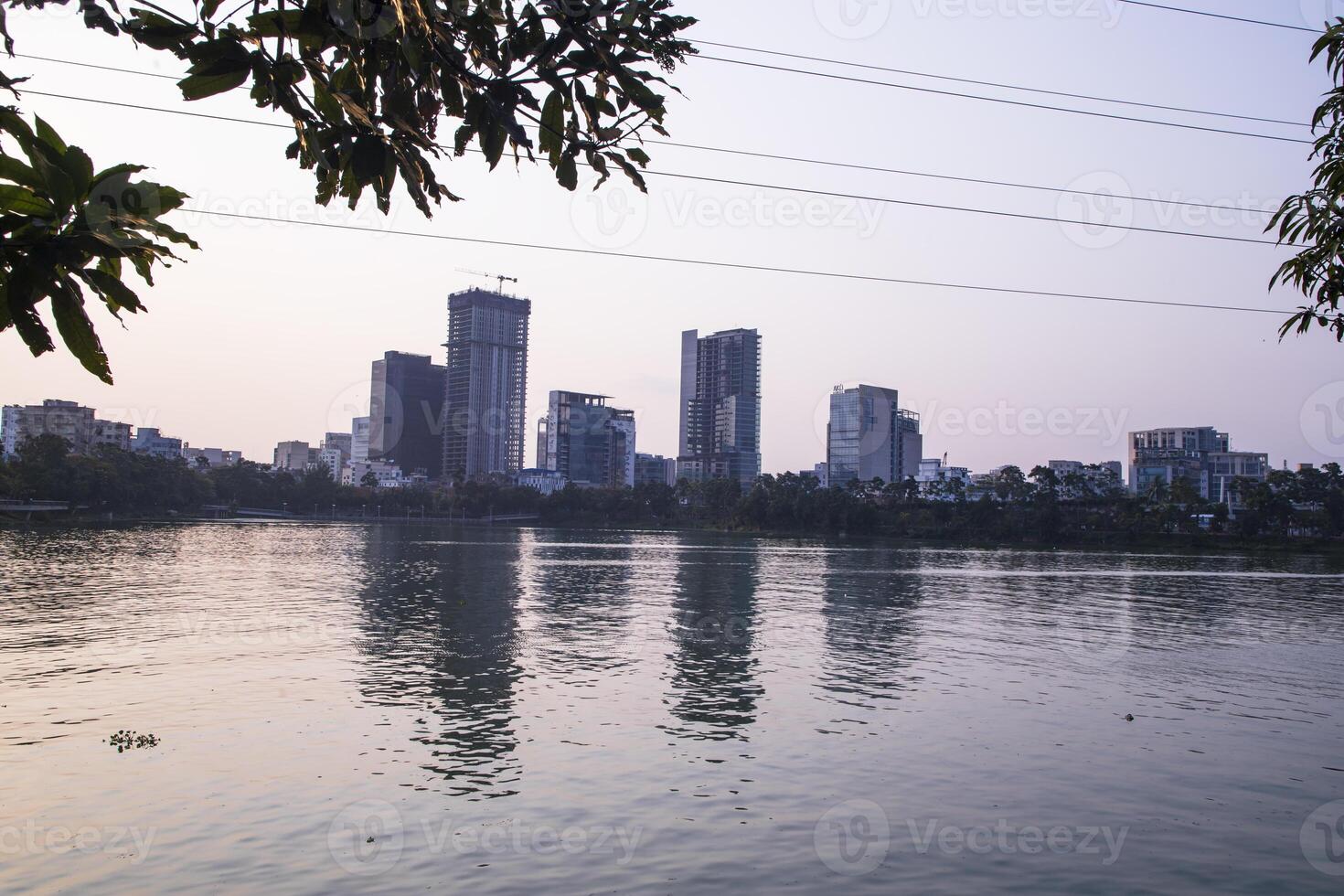 Beautiful Skylark landscape view of Hatirjheel lake with blue sky in Dhaka-Bangladdesh photo
