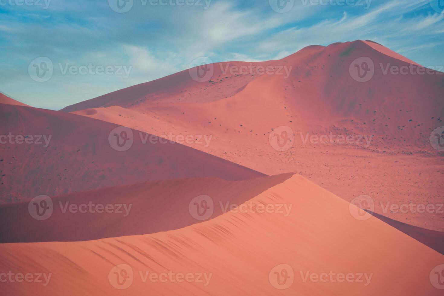 Atmospheric view on sand dunes in the desert of Namibia, Sossusvlei. photo