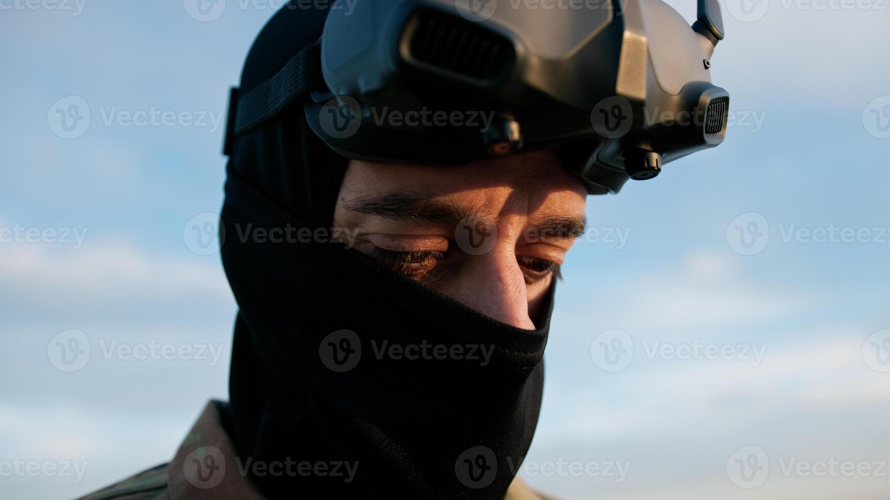 Army Man Kamikaze Drone Pilot With VR Headset On His Head photo