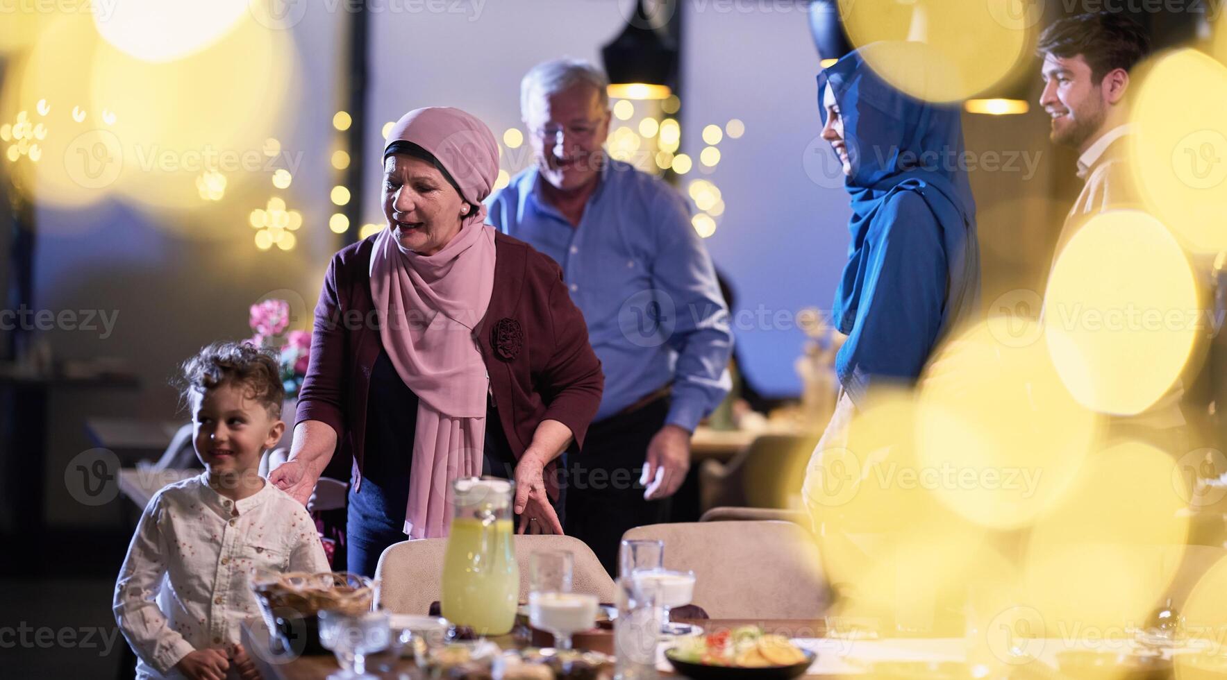 Grandparents arrive at their children's and grandchildren's gathering for iftar in a restaurant during the holy month of Ramadan, bearing gifts and sharing cherished moments of love, unity, and photo
