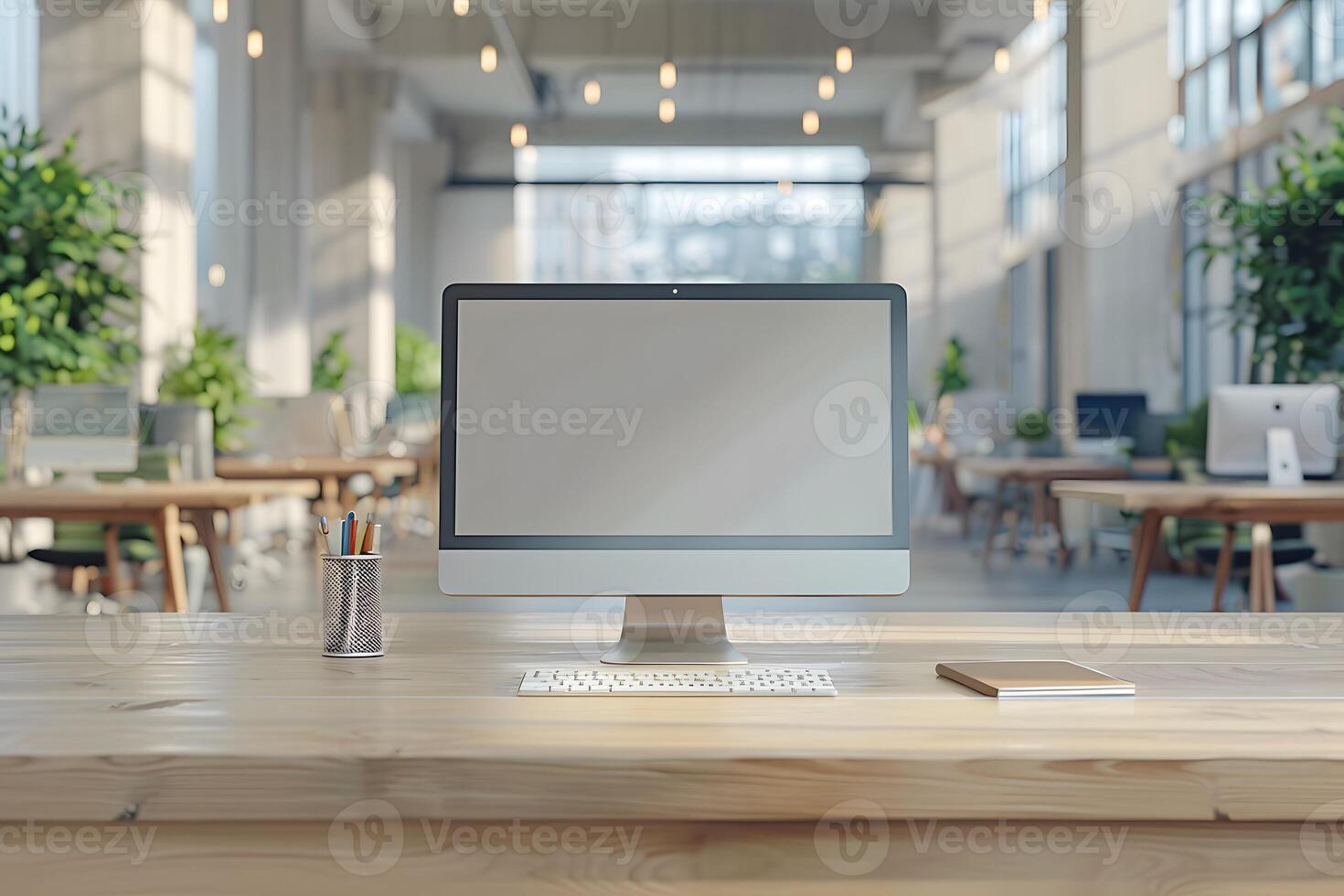 A computer monitor placed on a workstation in a spacious office photo