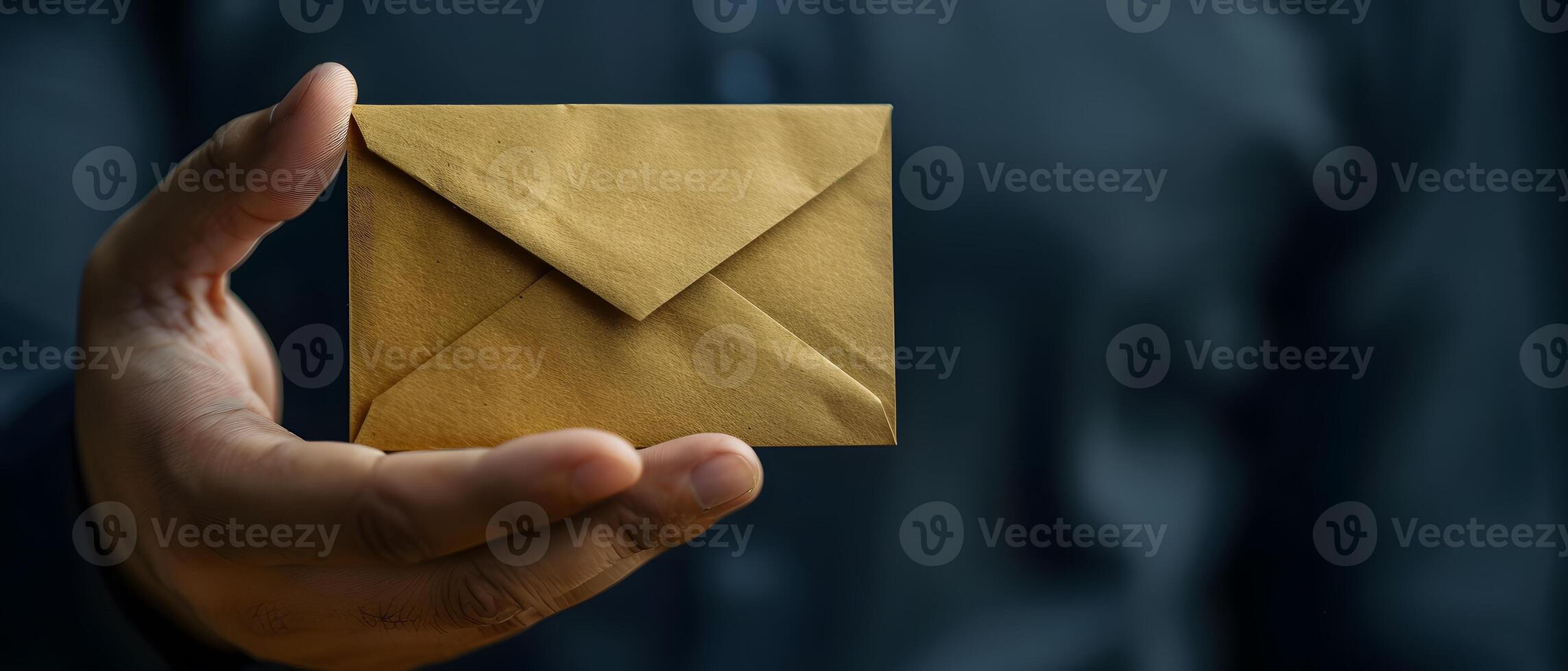 Person holding brown envelope hand photo