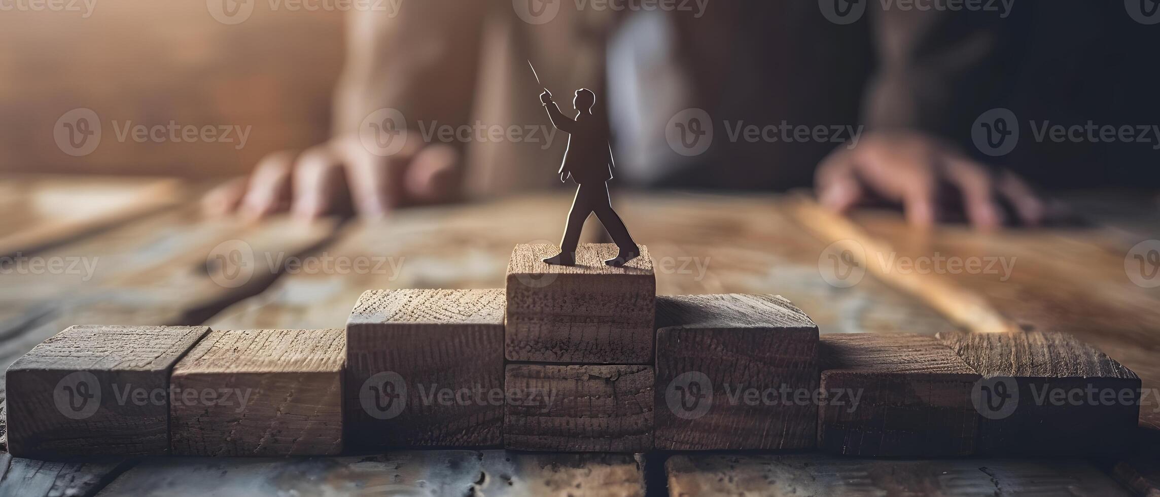 Person balancing on wooden block reaching high photo