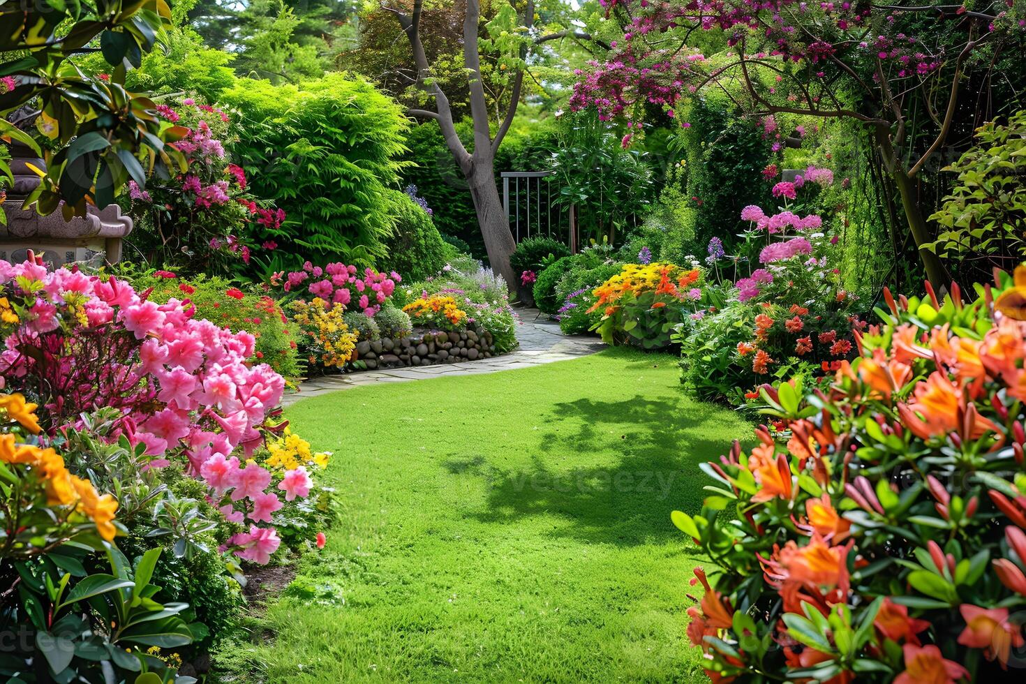 A garden filled with blooming flowers and lush trees in the background photo