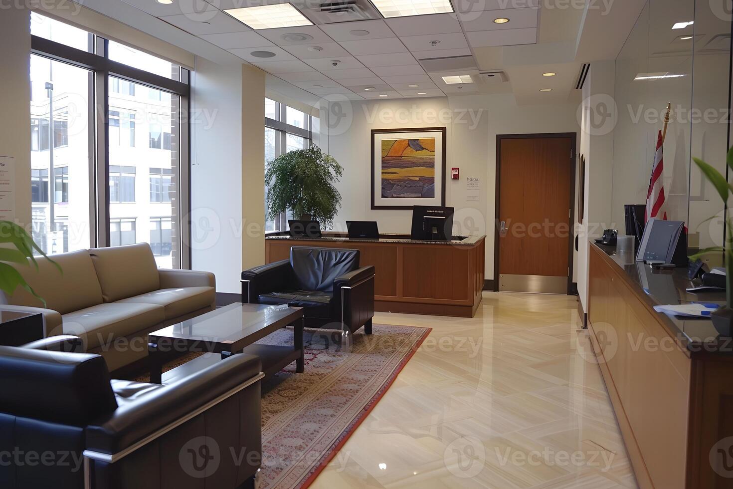 A lobby with a couch, chairs, and a television photo