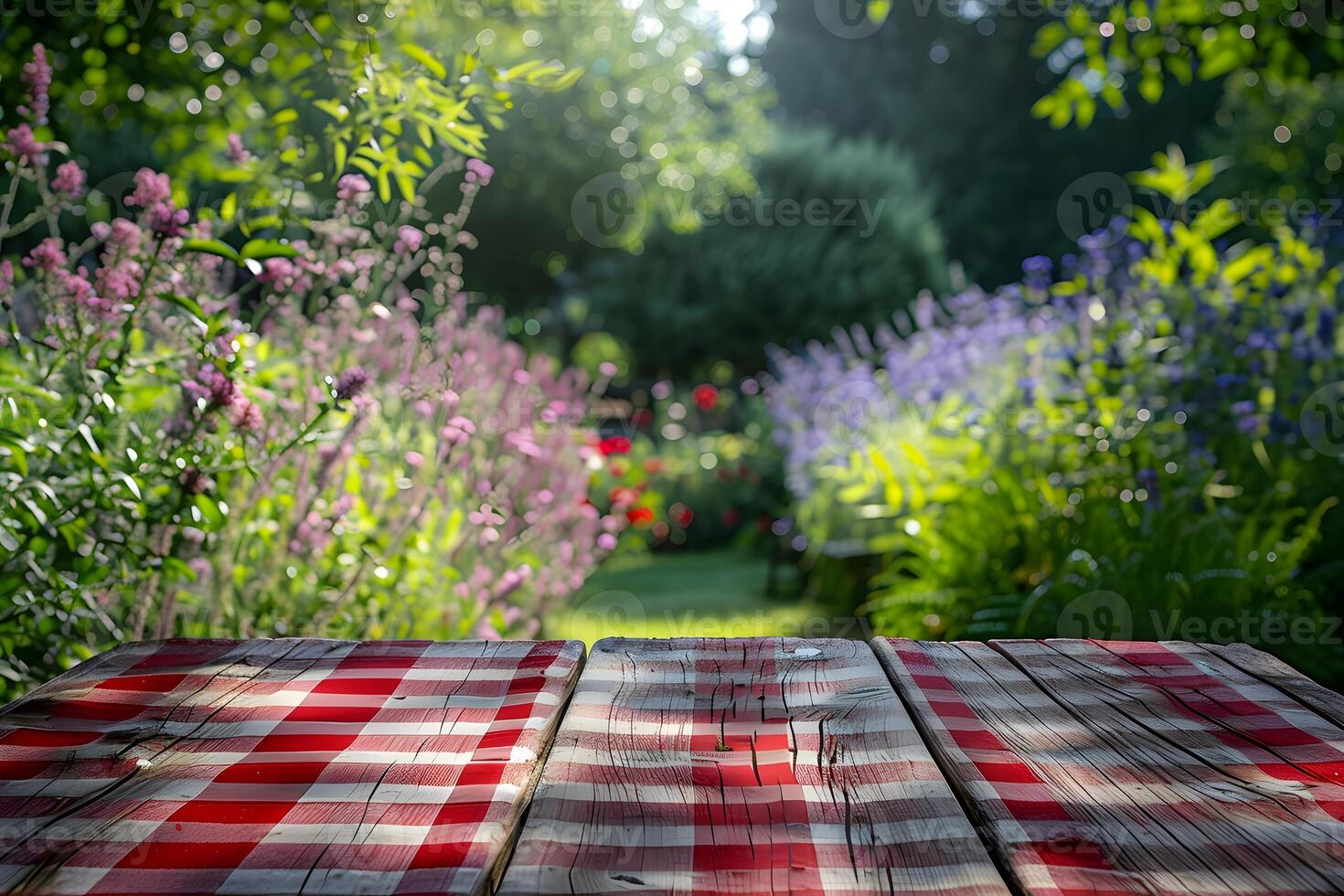 A close up of a table with a red and white checkered table cloth photo