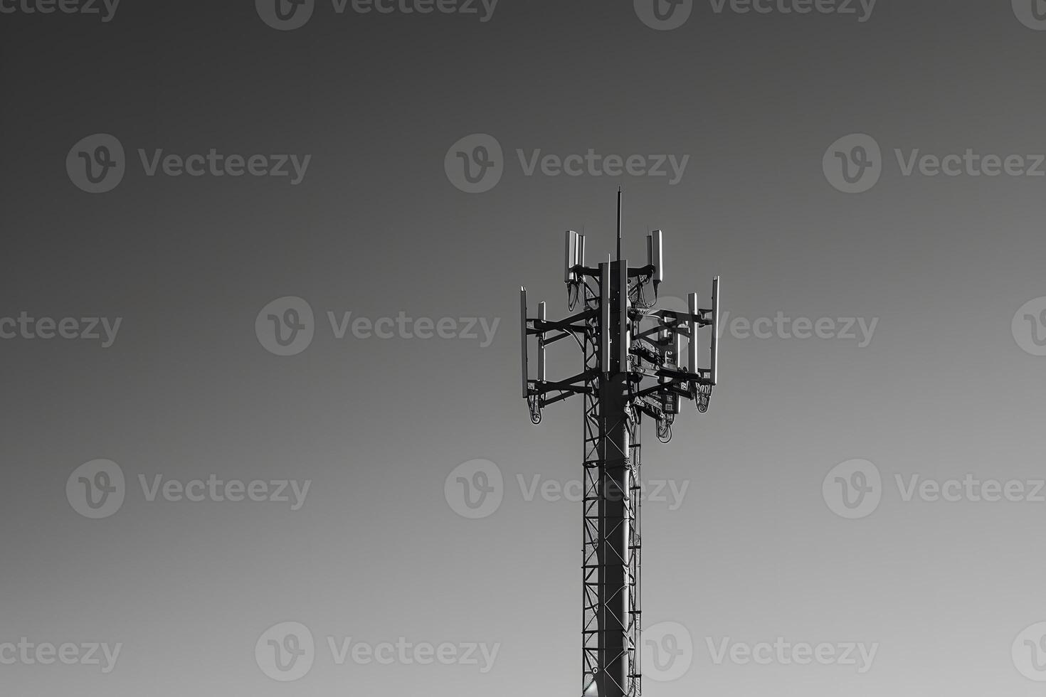 Cell tower with multiple antennas on top photo