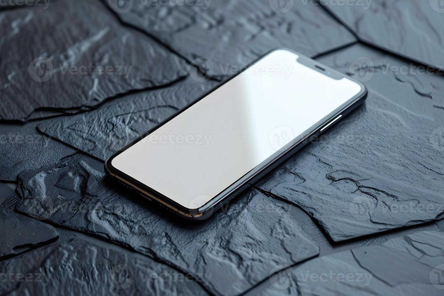 A cell phone close up on black surface photo