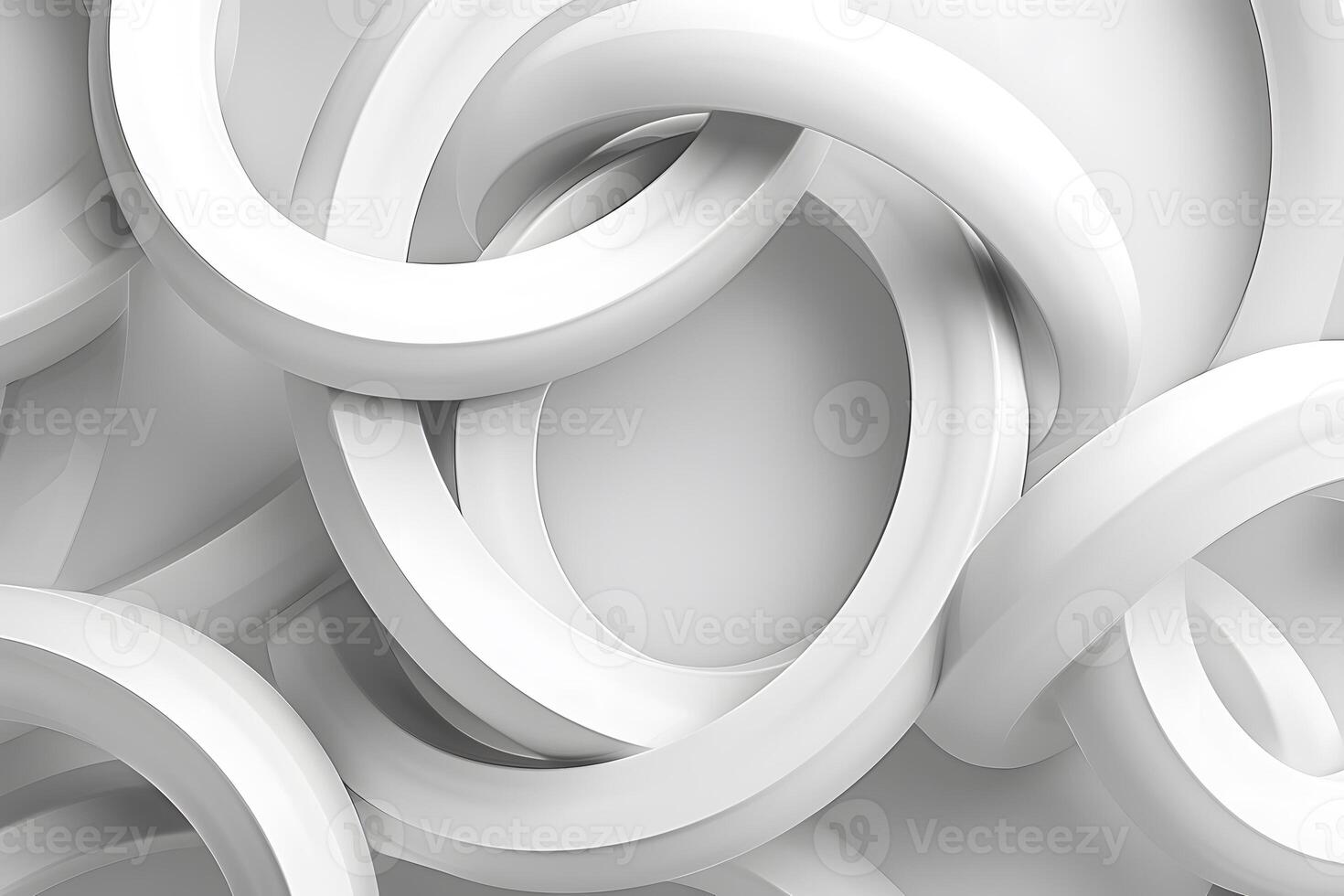 A close up of a bunch of white rings on a white surface photo