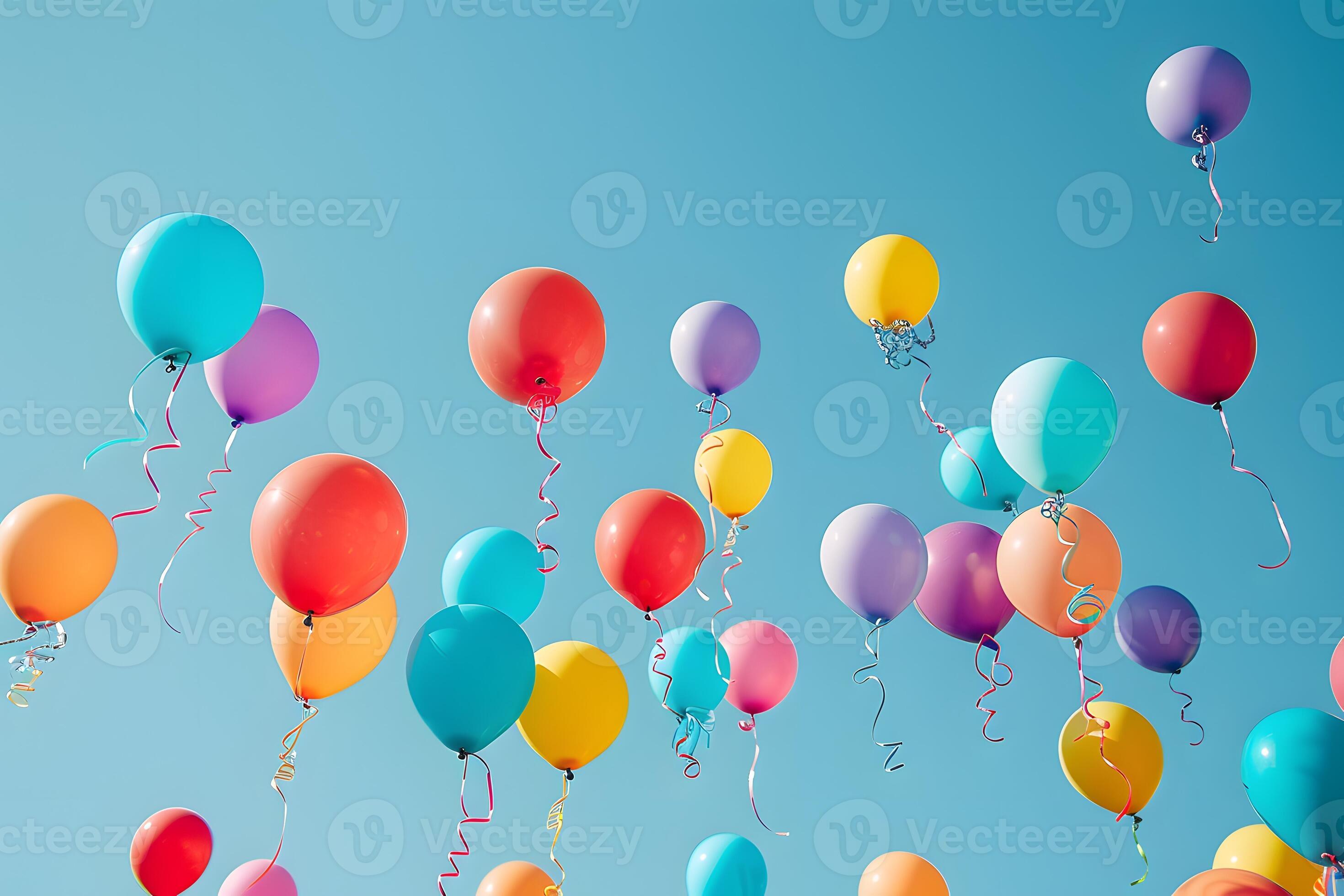 Colorful balloons float against blue sky 46275876 Stock Photo at Vecteezy