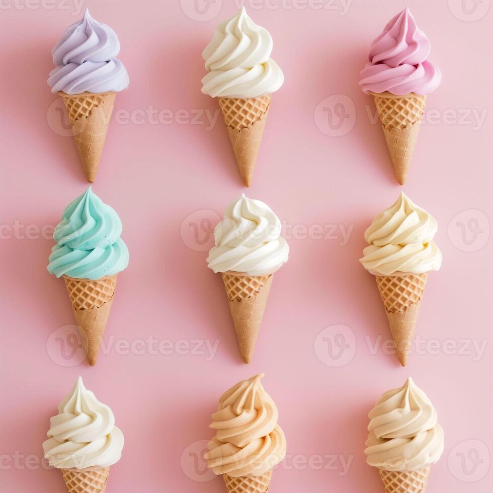 Assortment of nine pastel colour soft serve ice cream cones on pink backdrop, a pastel palette evokes sweetness and joy photo