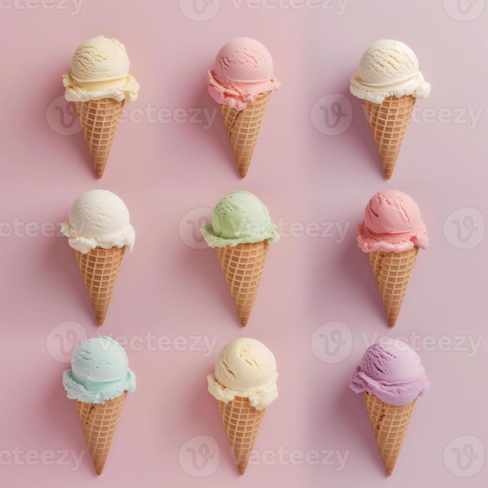 Assortment of nine soft serve ice cream cones on pink backdrop, a pastel palette evokes sweetness and joy photo