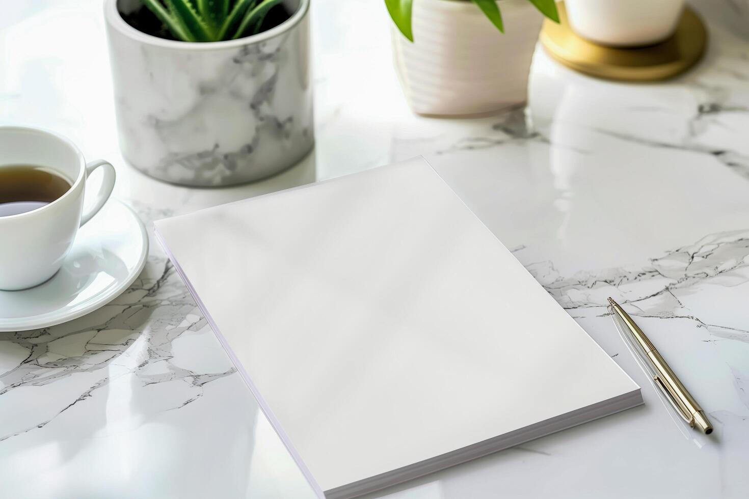 Notepad and coffee on table photo