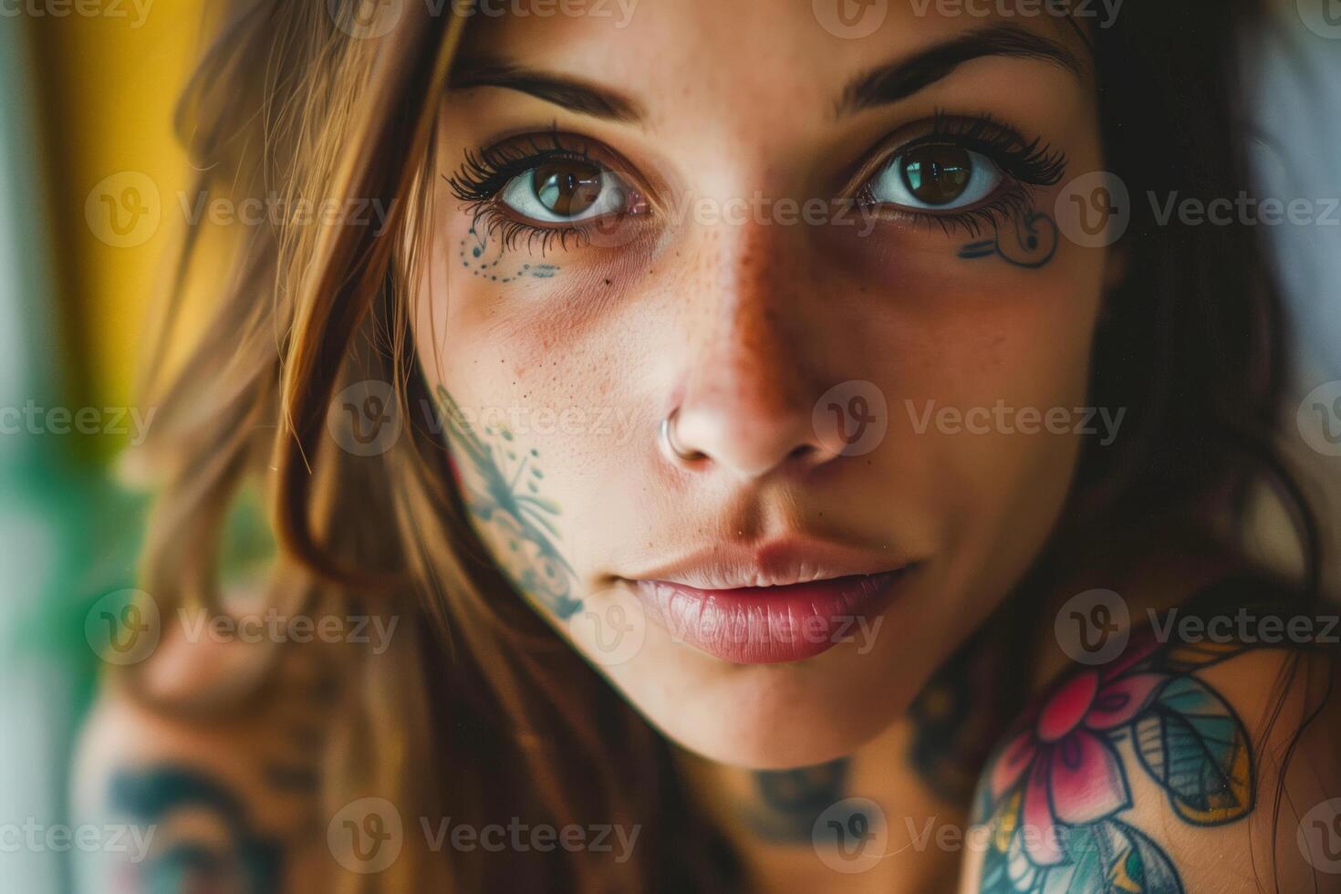Close up of woman with facial tattoos photo