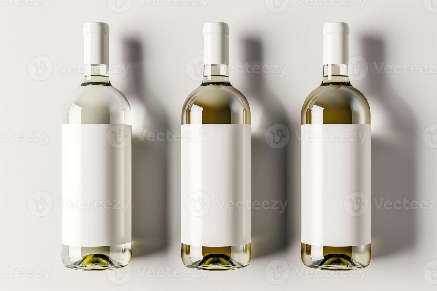 Three bottles of wine with a white label on a white surface photo