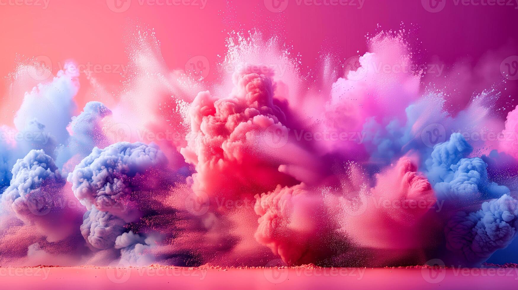 A large cloud of colored powder floating in the air photo