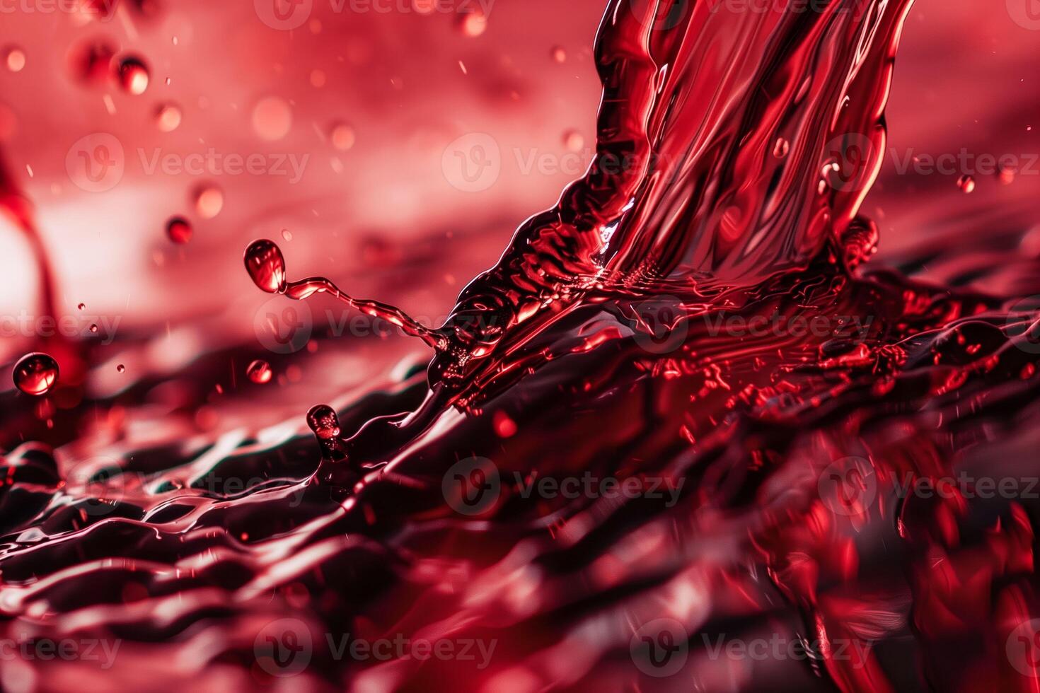 A close up of a red liquid splashing on a surface photo