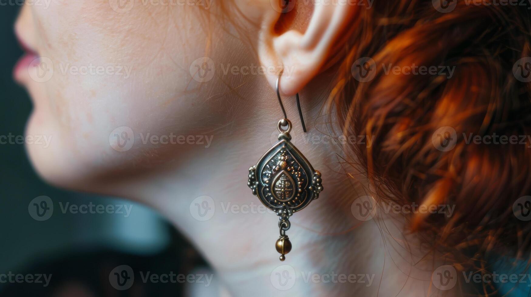 Elegant Vintage Earring on a Woman with Red Hair photo