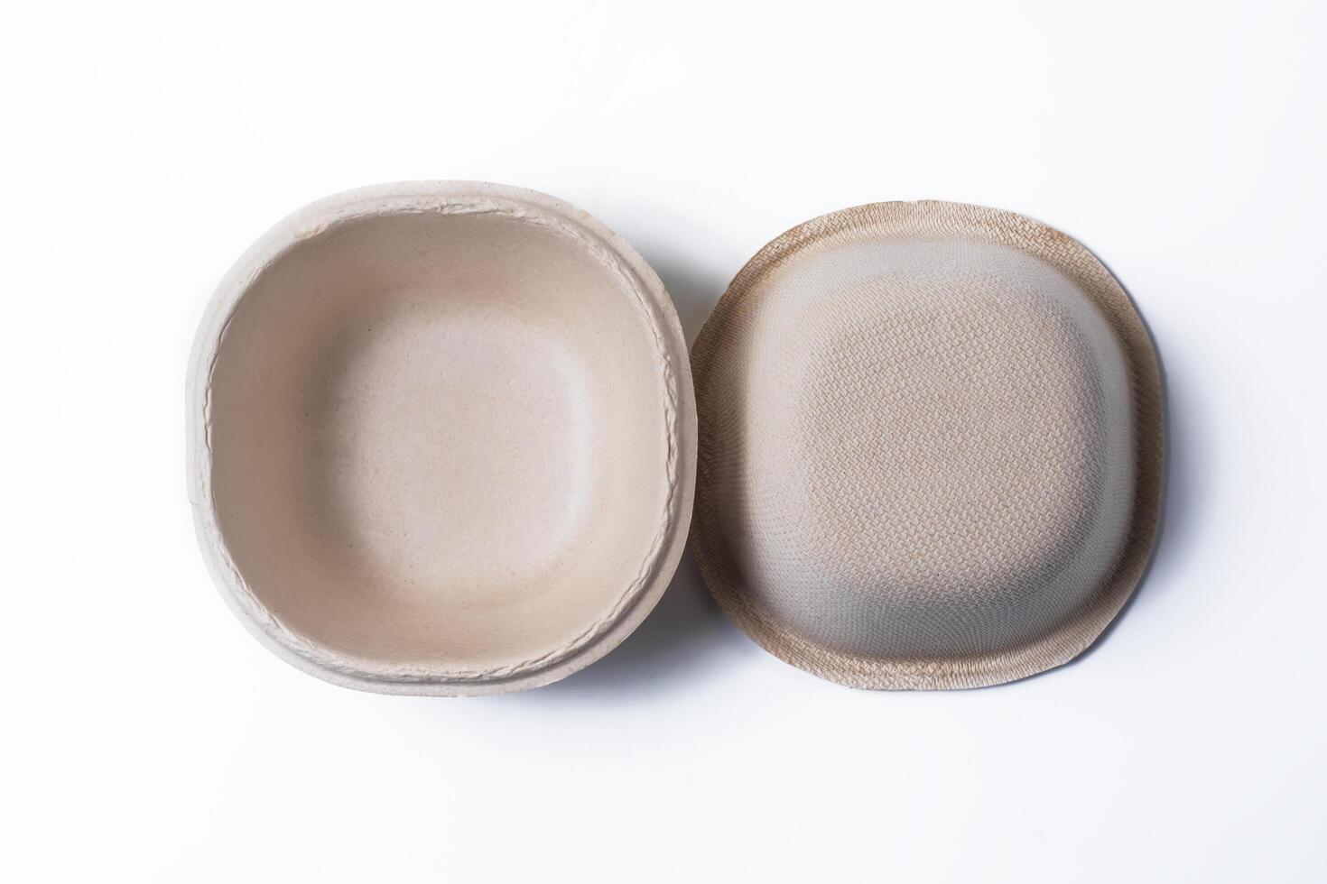 Top view of eco friendly biodegradable food container paper box on white background. photo