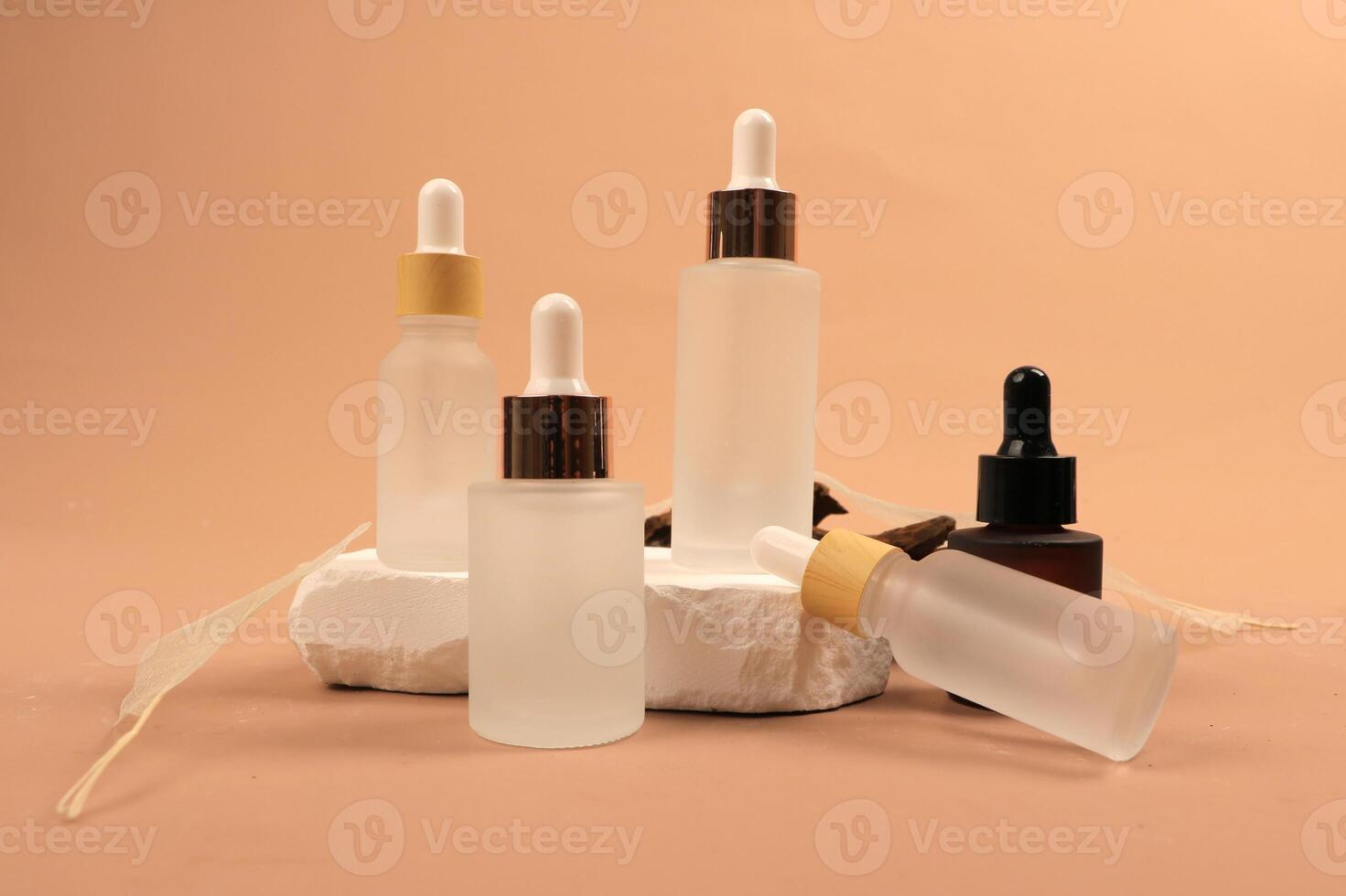 Minimalist Skincare Serum Bottles on Neutral Background photo