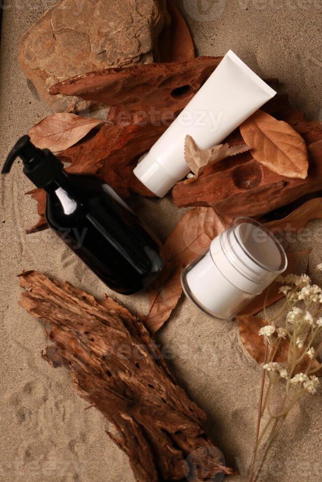Natural Skincare Products with Pump Bottle and Tubes on Rustic Background photo