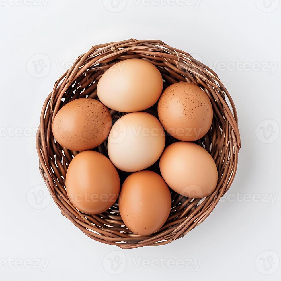 Chicken and quail eggs in a nest on a white background. photo