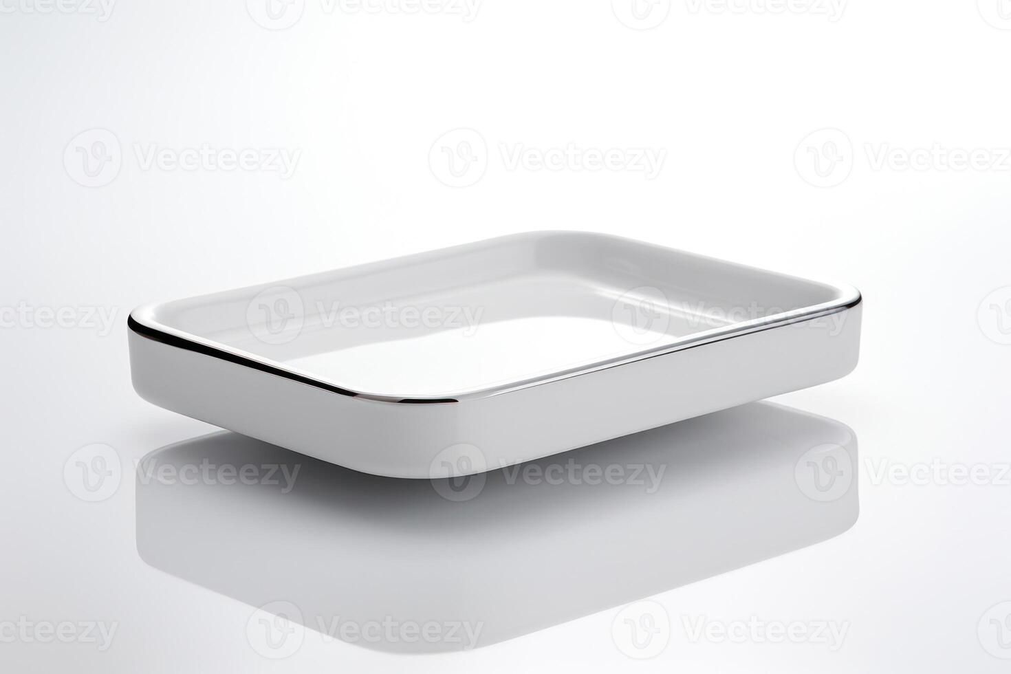 Clean, Modern White Ceramic Plate on Rectangular White Dishware Tray, Empty Background. photo