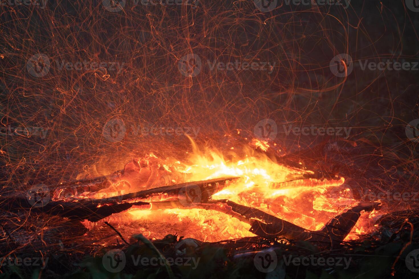 Flying sparks from a campfire photo