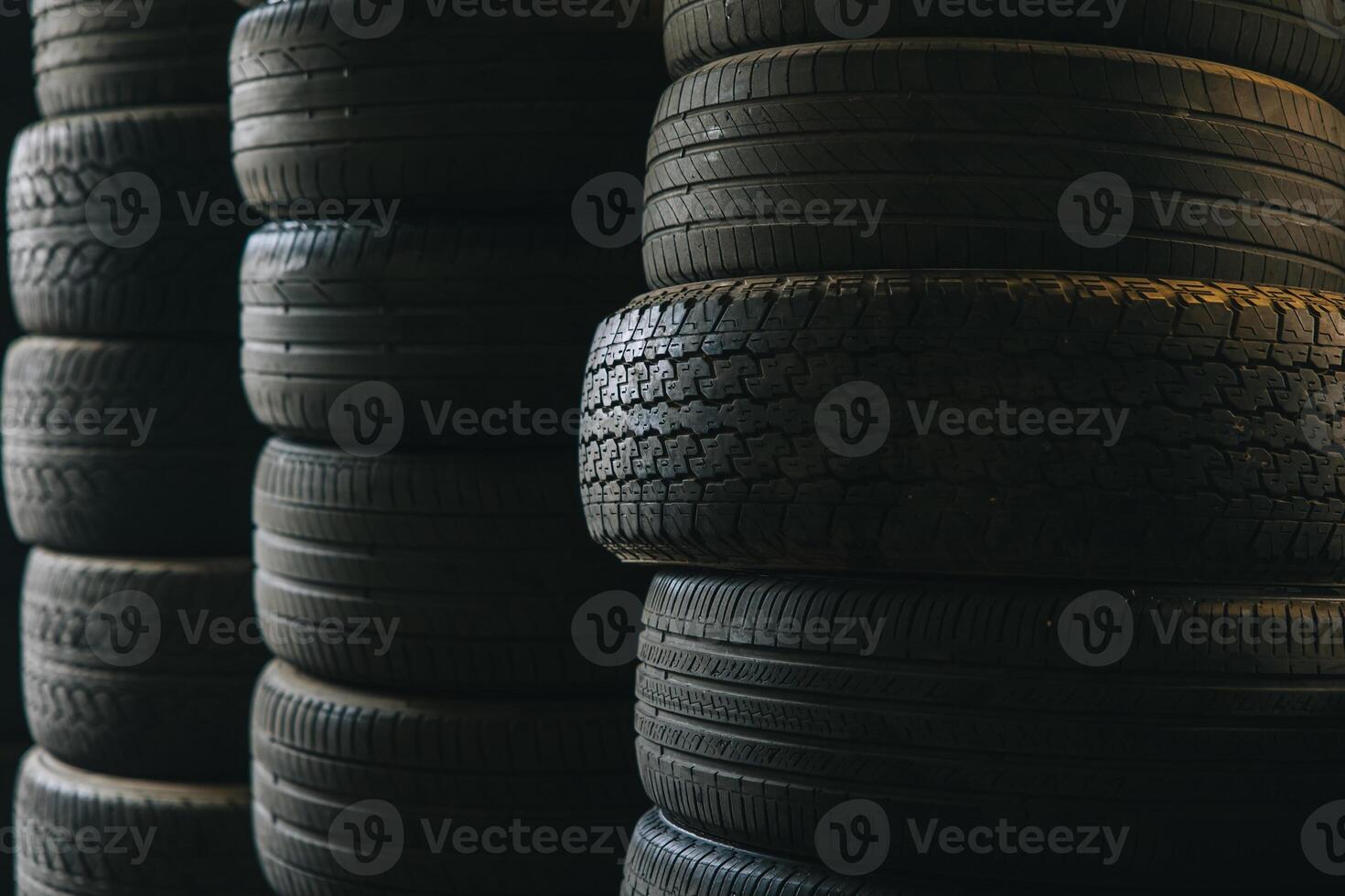 old used car tire stacked rubber waste need for recycle environment impact garbage photo
