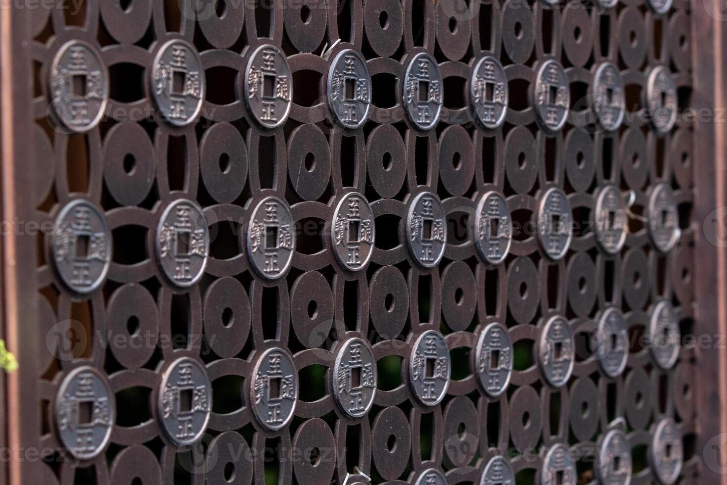 Chainese wall style. Bronze art pattern in the gallery. photo