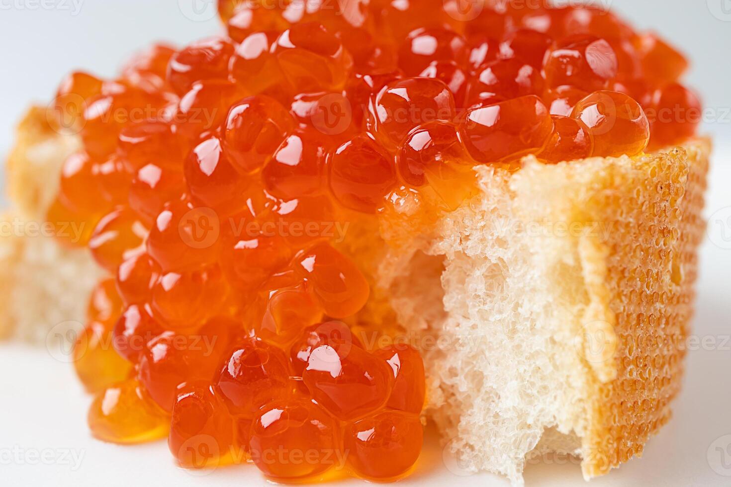 Bread with caviar close-up photo