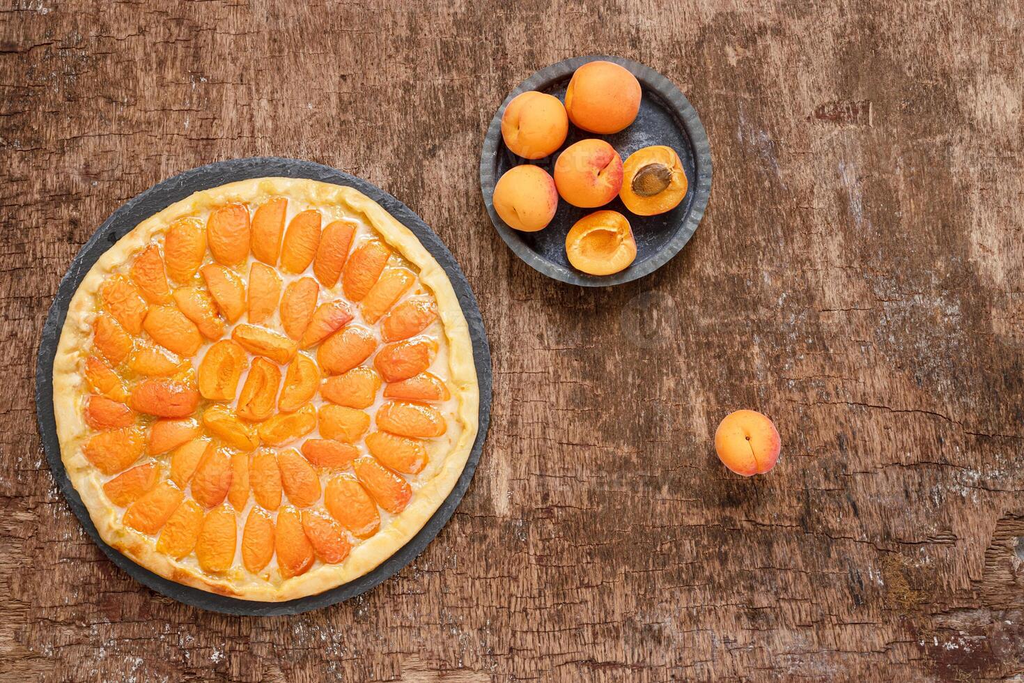 Fruit pizza on a wooden table photo