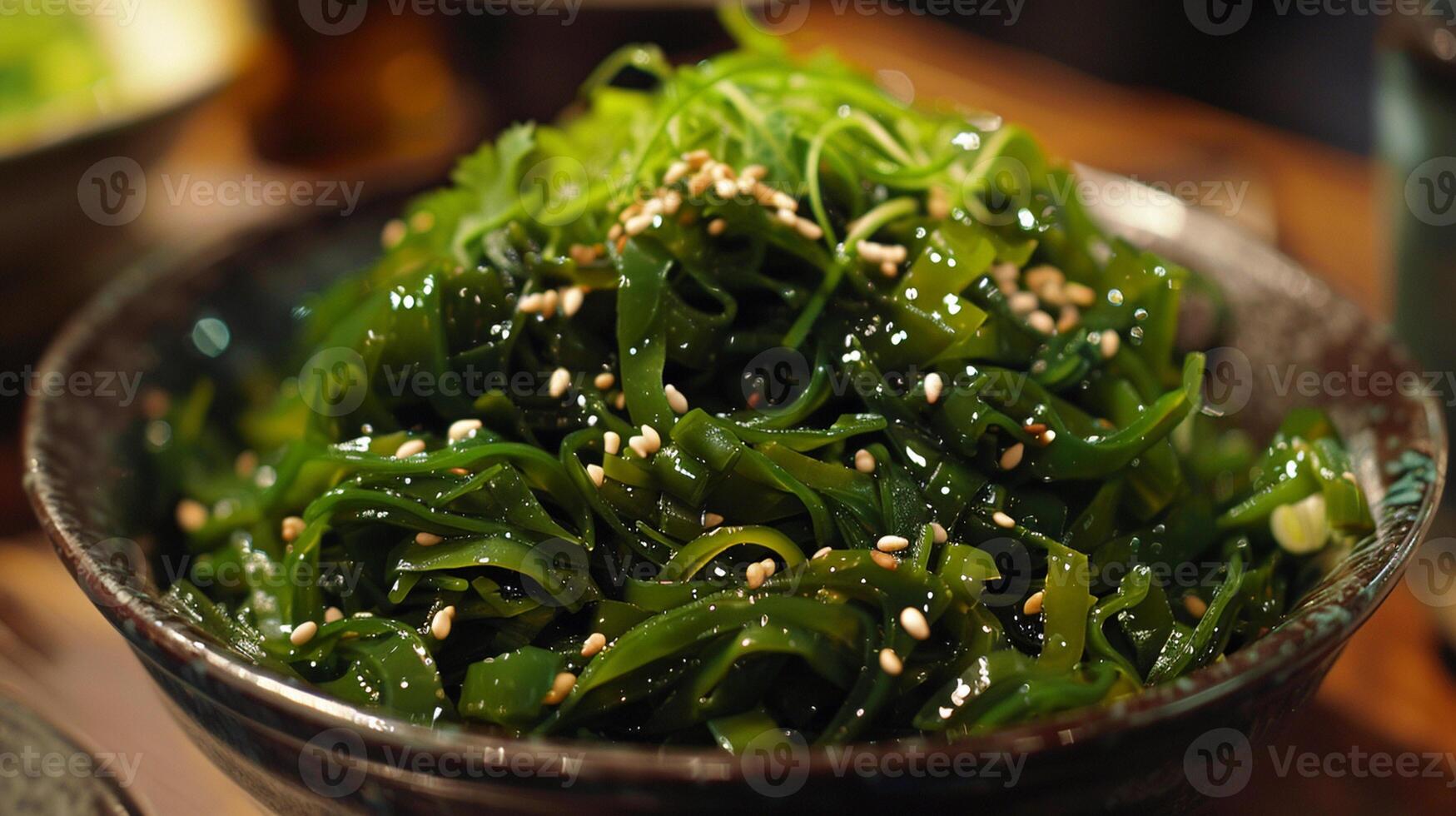 Traditional Japanese wakame salad with sesam seeds. Healthy and fresh seaweed salad photo