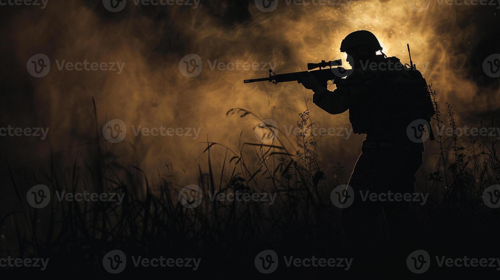 Silhouette of man with assault rifle on dark toned foggy background photo