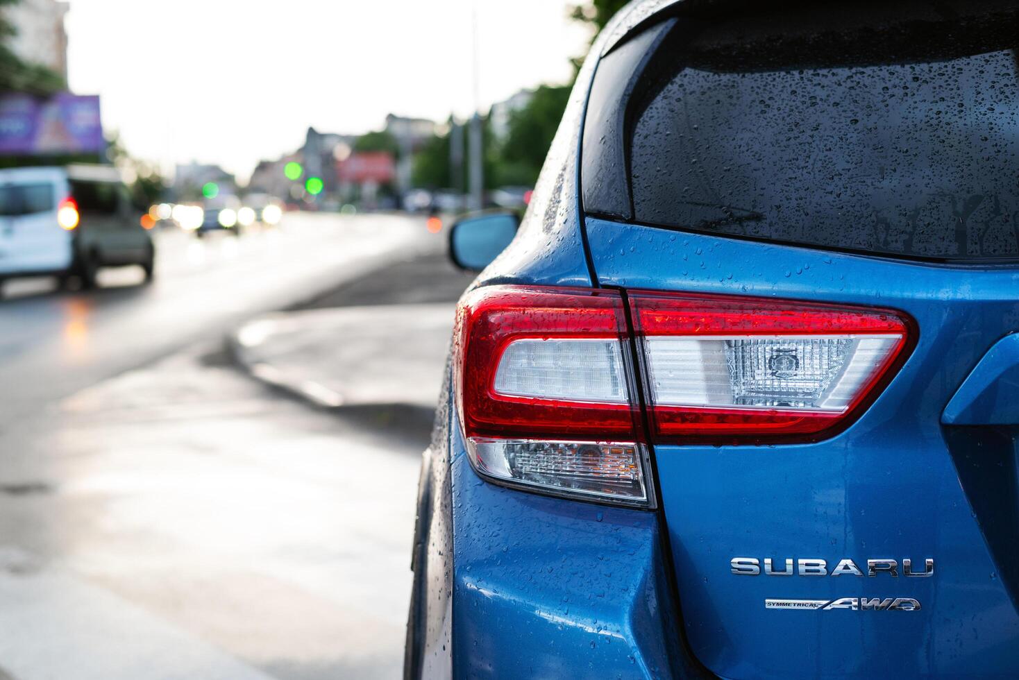 Kyiv, Ukraine - May 30, 2024. 2023 Blue Subaru Crosstrek AWD 2.0S rear view on the street photo