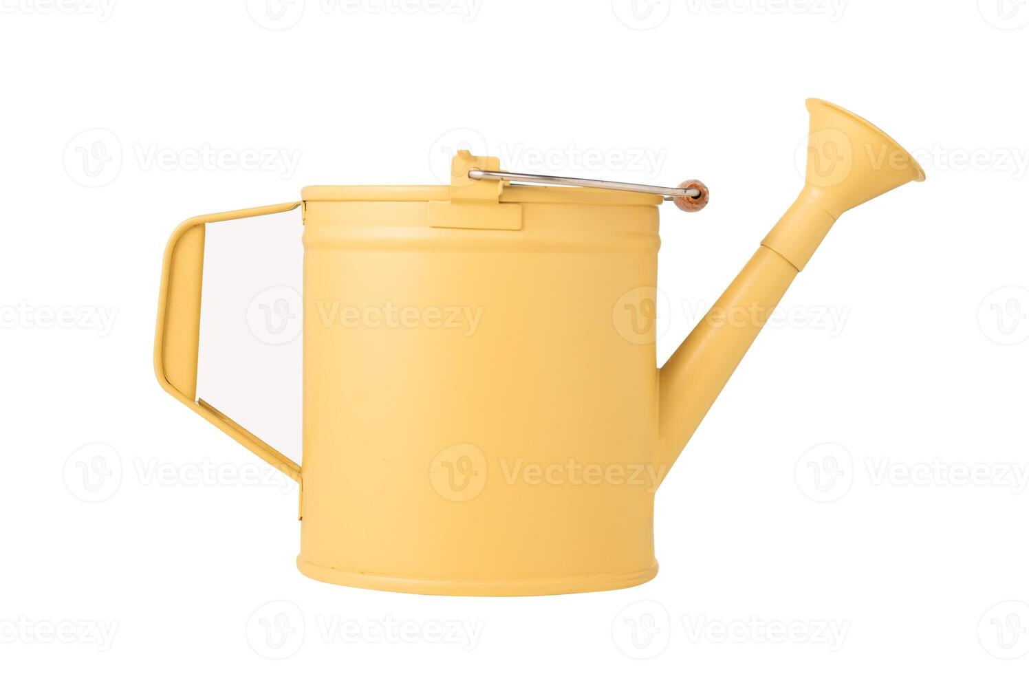 yellow iron watering can isolated on a white background photo