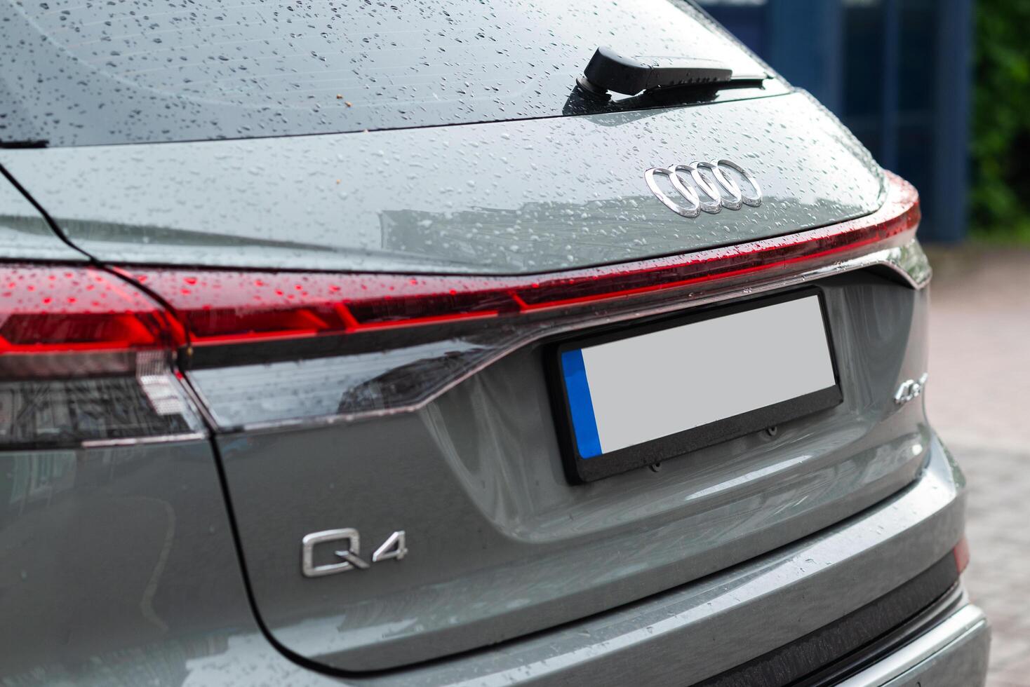 Kyiv, Ukraine - May 24, 2024. The Audi Q4 e-tron Sportback is a battery electric compact luxury crossover SUV back view. photo