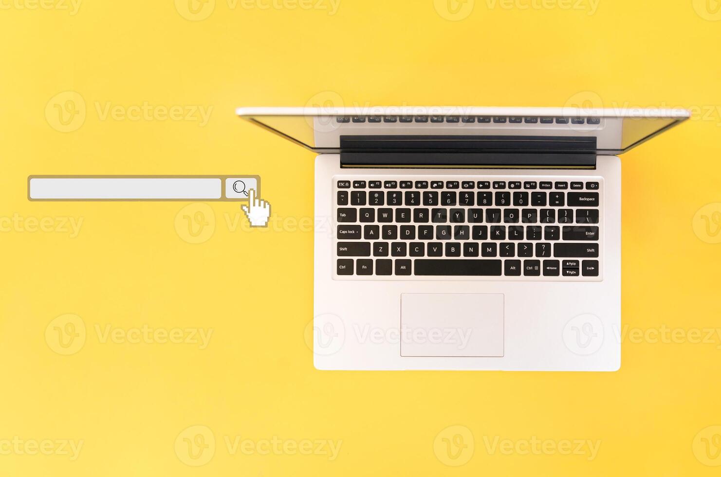 Open laptop on blue background with search bar. view from above. place for text. concept of online learning or remote work at home. place for text photo