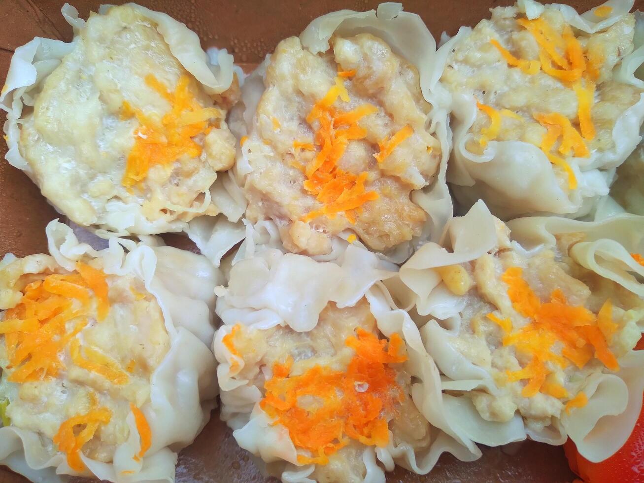 Dimsum is a large range of small dishes that Cantonese people traditionally enjoy in restaurants for breakfast and lunch. photo