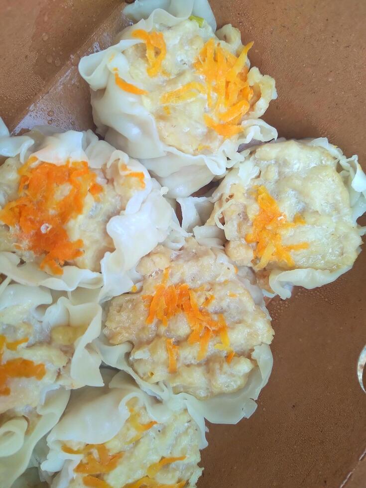 Dimsum is a large range of small dishes that Cantonese people traditionally enjoy in restaurants for breakfast and lunch. photo