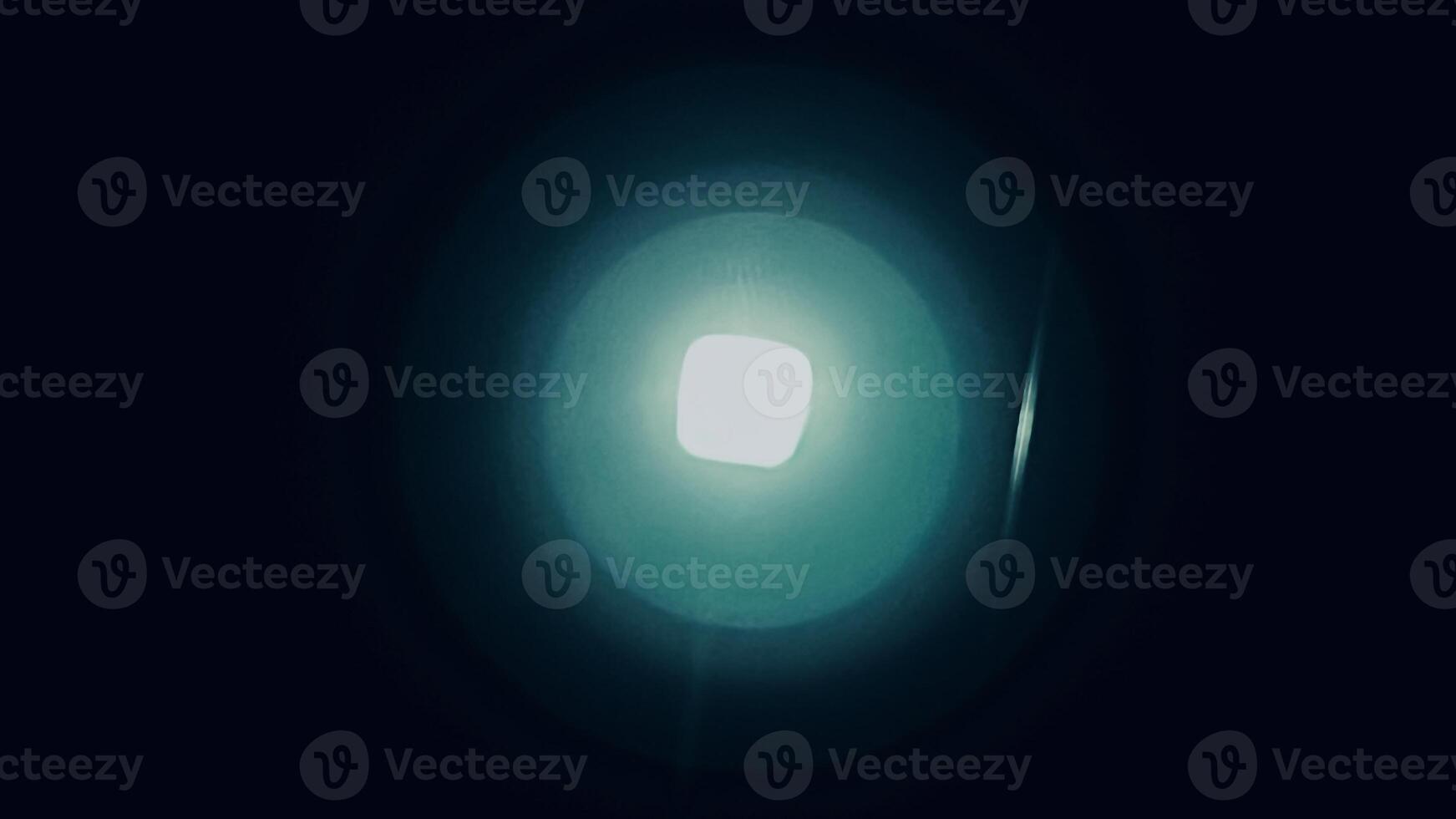 Reflection of a bright light forming into multiple layers from high to low level of brightness photo