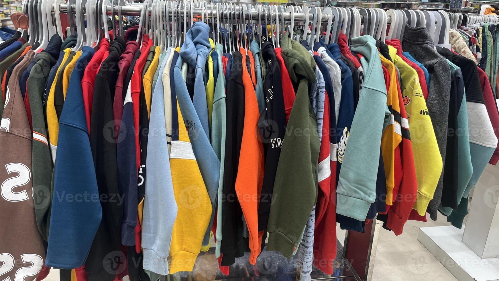 Boy child clothes collections in a largest clothes shop photo