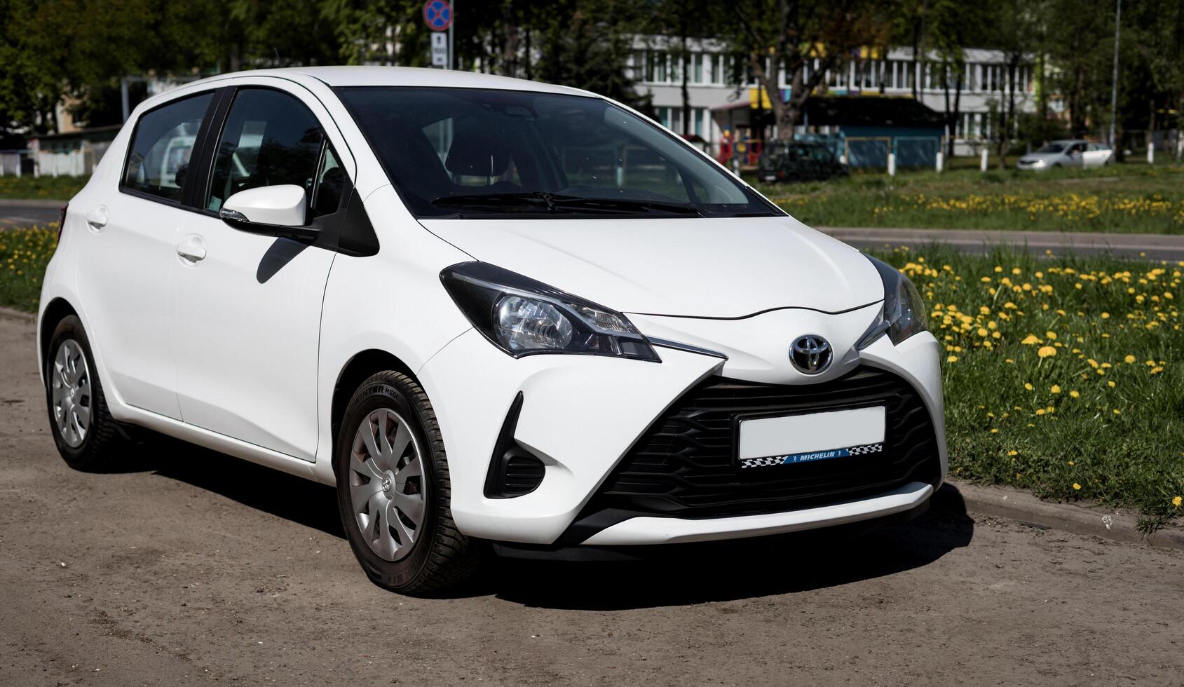 Minsk, Belarus, May 17, 2024 - Compact japanese white Toyota Yaris photo