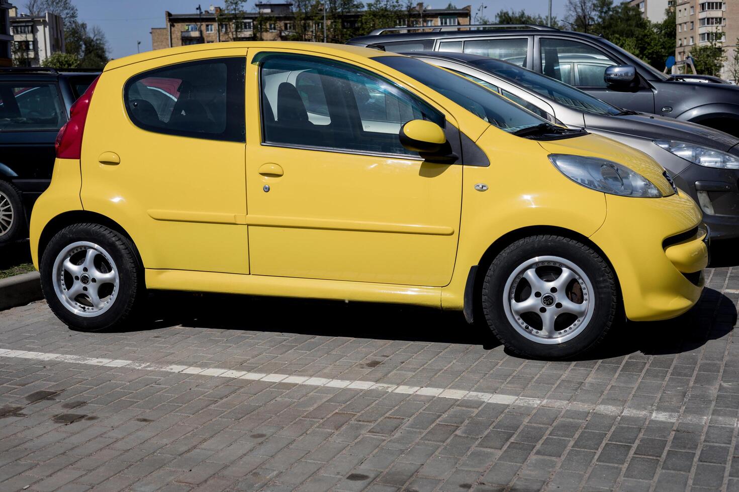 Minsk, Belarus, may 21, 2024 - yellow Peugeot 107 photo